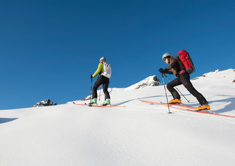 with the ski to the summit - skiing - ski touring