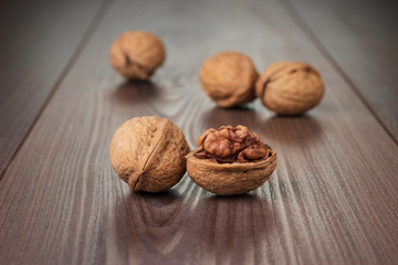 walnuts on the brown wooden table