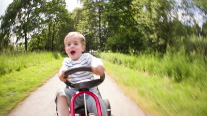 Little Boy in Pedal Car