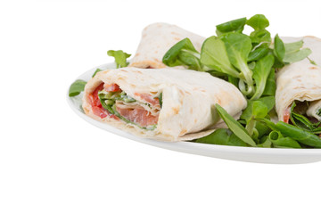 pita bread with salmon on a plate