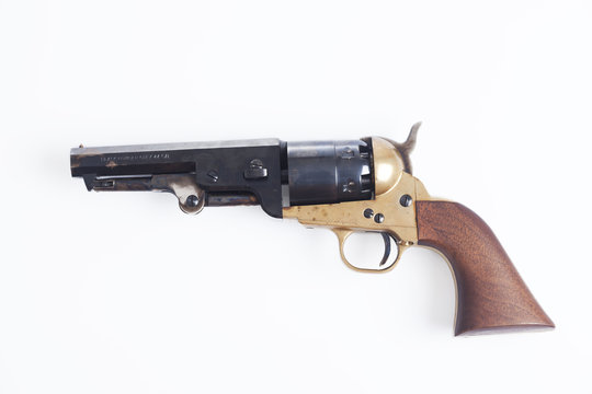Old revolver on white background with clipping path