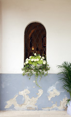 Detail of church with flowers