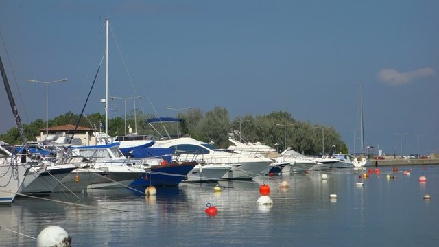 Boats and yachts in the Port of Fanari, Greece