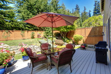 Obraz na płótnie Canvas Backyard patio area with landscape