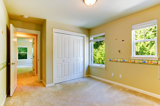 Empty Kids Room With Painted Walls