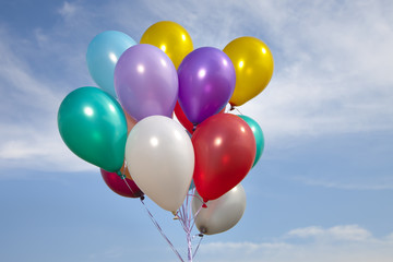 colorful ballons in a blue sky