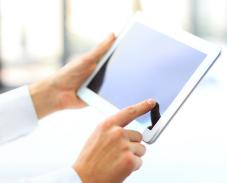hands touching digital tablet with business diagram
