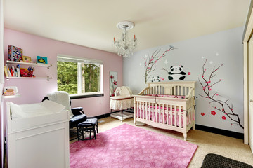 Light pink and blue nursery room with crib - obrazy, fototapety, plakaty