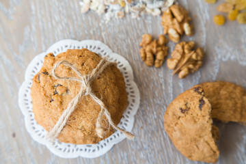 Three oat biscuits with raisins and walnuts