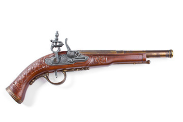 Old wooden gun, upper side, selective focus, on white background