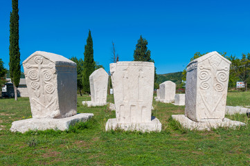 Many monumental medieval tombstones lie scattered in Herzegovina