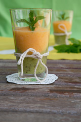 A glass of smoothie melon-kiwi
