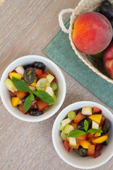 Fruit salad in white dishes