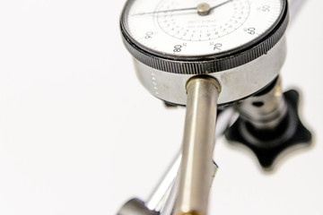 pressure gauge with black text on a white face