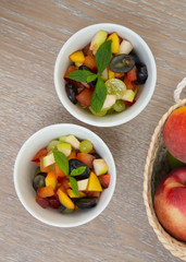 Fruit salad in white dishes