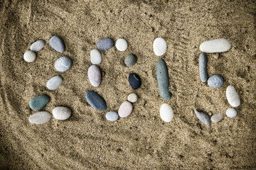 Stones on sand closeup