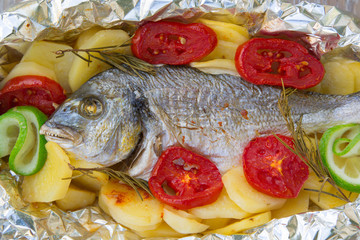 Baked gilthead with vegetables