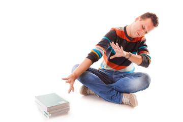 tired college student with stack of books studying 
