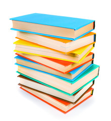 Multi-coloured books. On white background.