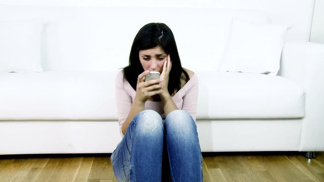 Sad woman discovering trouble on social network