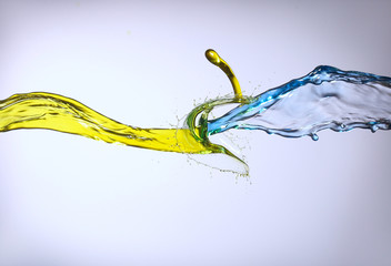 yellow and blue liquid jets