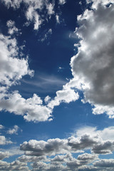 Fototapeta premium Blue sky with white cumulus clouds.