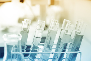 the lab or laboratory test tubes with colorful liquid
