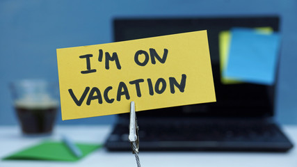 I am on vacation written