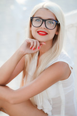 Fototapeta na wymiar beautiful blond woman in glasses