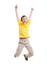Funny child in yellow t-shirt jumping and laughing