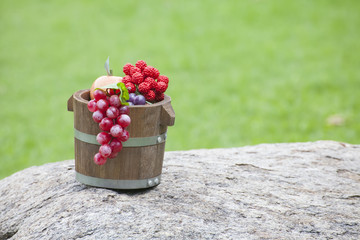 grape in wood basket