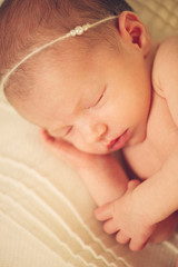 Dreaming Naked Newborn Baby Sleeping with Band