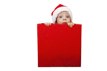 Christmas baby in red gift box - obrazy, fototapety, plakaty