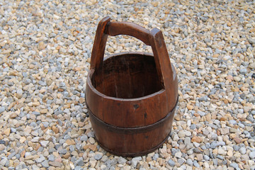 A Traditional Farming Wooden Milk Carrying Bucket.