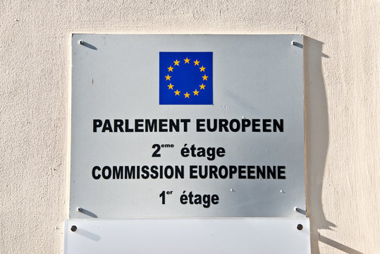 European Parliament And Commission Sign On A Wall