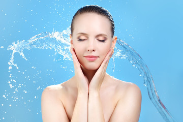 Beautiful girl and stream of water