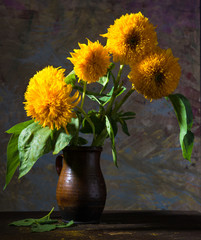 Still life with beautiful sunflowers in vase