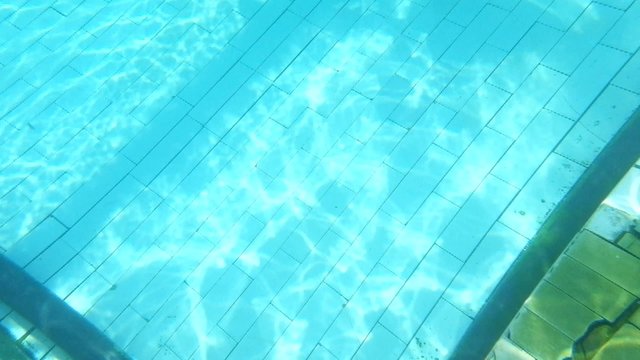 Transparent blue water ripples underwater footage