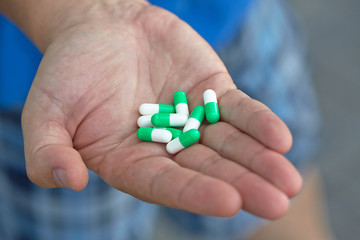 the doctor gave the patient medication capsules