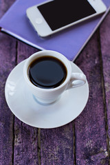 Fototapeta na wymiar diary, mobile phone and a cup of coffee
