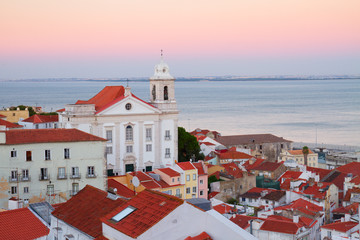 Fototapeta premium view of Alfama at sunset, Lisbon, Portugal
