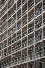scaffolding on facade of high rise building
