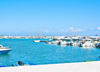 Fototapeta na wymiar sea port with boats in the sunny day