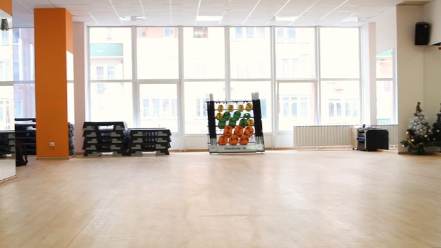 Interior of modern fitness club