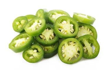 Keuken spatwand met foto sliced green jalapeno peppers on white background © phloen