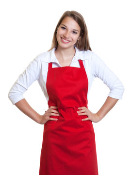 Lachende Frau mit roter Sch&uuml;rze