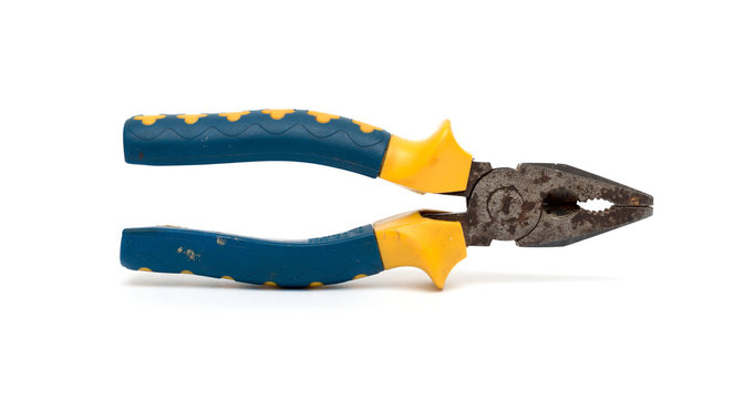 rusty pliers tools with rubber handle isolated in white backgrou