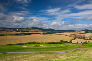 Fototapeta na wymiar Golf course in autumn landscape