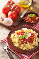 italian classic pasta fusilli with tomato sauce and basil
