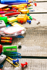 Fototapeta premium School tools. On wooden background.